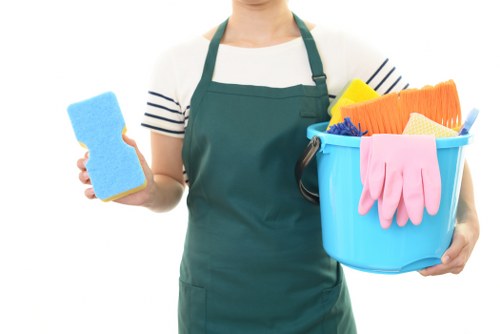 Local office cleaners in Brixton sanitising desks and shared areas